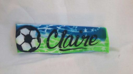 A close up of the name claire on a wristband